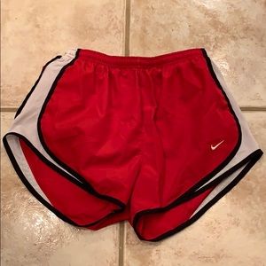 Like-new red Nike tempo running shorts